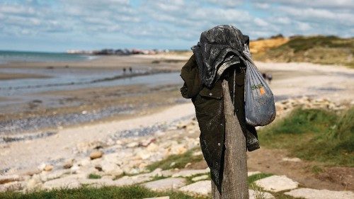Clothes and a bag are left on a beach near Wimereux, after several people reportedly died trying to ... Clothes and a bag are left on a beach near Wimereux, after several people reportedly died trying to ...