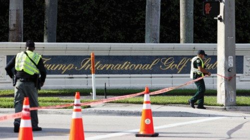 Law enforcement officers work after reports of shots fired outside Republican presidential nominee ...