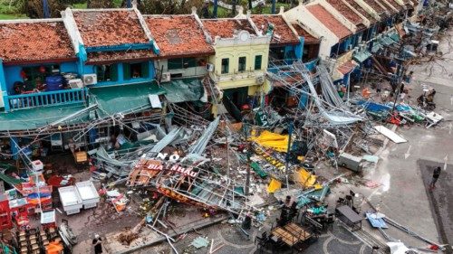 (FILES) This aerial picture shows damaged buildings and debris on a street after Super Typhoon Yagi ... (FILES) This aerial picture shows damaged buildings and debris on a street after Super Typhoon Yagi ...