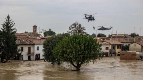 TOPSHOT - People are evacuated by helicopters of the Italian Air Force during floods in the small ... TOPSHOT - People are evacuated by helicopters of the Italian Air Force during floods in the small ...