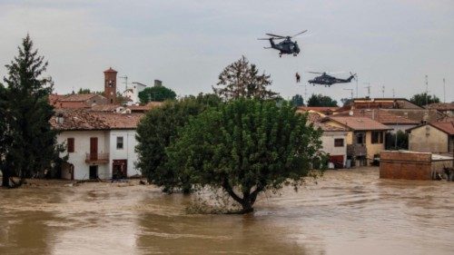 TOPSHOT - People are evacuated by helicopters of the Italian Air Force during floods in the small ... TOPSHOT - People are evacuated by helicopters of the Italian Air Force during floods in the small ...
