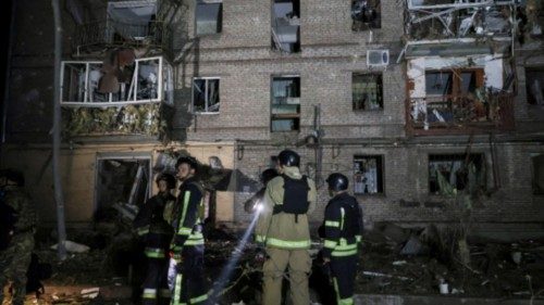 epa11620184 Ukrainian rescuers work at the site of the overnight shelling of a residential building ... epa11620184 Ukrainian rescuers work at the site of the overnight shelling of a residential building ...