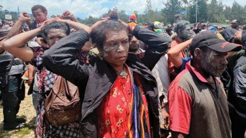 Villagers take part in a gathering near the Porgera Gold Mine in Porgera in the central highlands of ... Villagers take part in a gathering near the Porgera Gold Mine in Porgera in the central highlands of ...