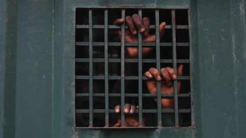 The hands of recaptured inmates are seen inside a prison vehicle in Abuja, Nigeria on July 6, 2022, ... The hands of recaptured inmates are seen inside a prison vehicle in Abuja, Nigeria on July 6, 2022, ...