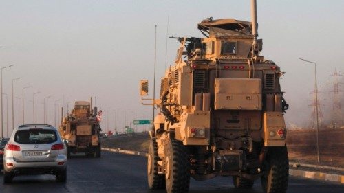 A convoy of US military vehicles drives in Arbil, the capital of the autonomous Kurdish region of ... A convoy of US military vehicles drives in Arbil, the capital of the autonomous Kurdish region of ...
