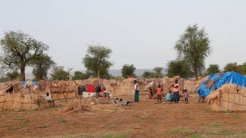 Internally displaced people from Khartoum gather at their shelter in an IDP camp within the Sudan ... Internally displaced people from Khartoum gather at their shelter in an IDP camp within the Sudan ...