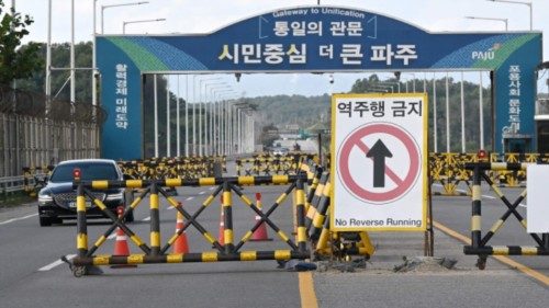 A car drives past barricades at a military checkpoint on the Tongil bridge, the road leading to ... A car drives past barricades at a military checkpoint on the Tongil bridge, the road leading to ...