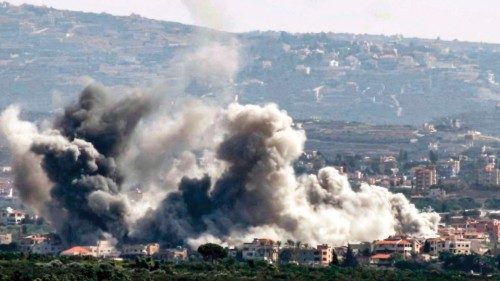 This picture taken from Lebanon's southern city of Tyre shows a cloud of smoke erupting following an ... This picture taken from Lebanon's southern city of Tyre shows a cloud of smoke erupting following an ...