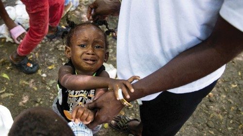 A child reacts as families displaced from their homes after a deadly attack by members of the Gran ... A child reacts as families displaced from their homes after a deadly attack by members of the Gran ...