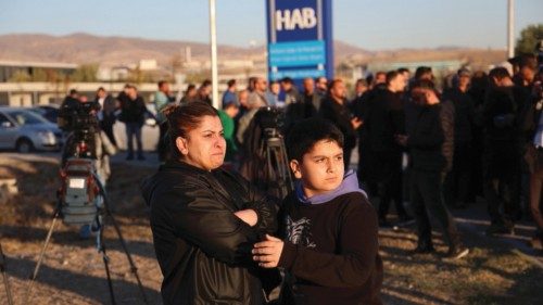 epaselect epa11677763 Relatives of employees wait outside following a terror attack at (TUSAS) ... epaselect epa11677763 Relatives of employees wait outside following a terror attack at (TUSAS) ...