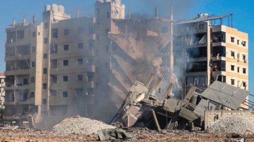 This picture shows the rubble of destroyed buildings the site of last night's Israeli airstrike that ... This picture shows the rubble of destroyed buildings the site of last night's Israeli airstrike that ...