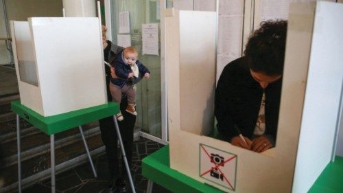 People vote during parliamentary elections at a polling station in Tbilisi, Georgia October 26, ... People vote during parliamentary elections at a polling station in Tbilisi, Georgia October 26, ...