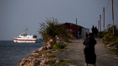 An Italian coast guard vessel leaves for Italy with migrants, who were intercepted at sea and later ... An Italian coast guard vessel leaves for Italy with migrants, who were intercepted at sea and later ...