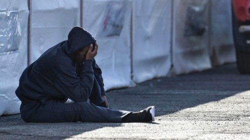epa11685625 A rescued migrant rests at the reception center in El Pinar, on the island of El Hierro, ...