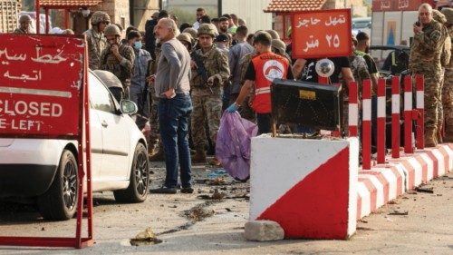 People gather in the aftermath of an Israeli strike on a vehicle, at the entrance of Sidon, Lebanon ... People gather in the aftermath of an Israeli strike on a vehicle, at the entrance of Sidon, Lebanon ...