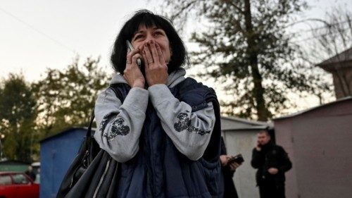A resident reacts as she stands at a site of an apartment building hit by a Russian air strike, amid ... A resident reacts as she stands at a site of an apartment building hit by a Russian air strike, amid ...