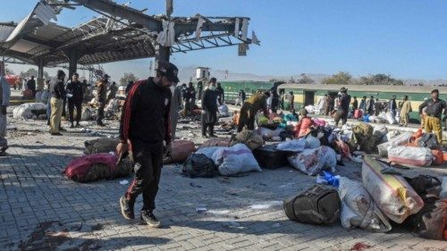 A security personnel inspects the blast site after an explosion at a railway station in Quetta, in ... A security personnel inspects the blast site after an explosion at a railway station in Quetta, in ...