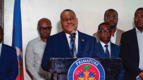 (FILES) Haiti's Prime Minister Garry Conille speaks to the press on his return to Port-au-Prince, ... (FILES) Haiti's Prime Minister Garry Conille speaks to the press on his return to Port-au-Prince, ...