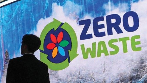epa11718704 A visitor stands near Zero Waste foundation pavilion at the UN Climate Change Conference ...