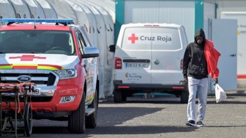 epa11711504 A rescued migrant walks past Red Cross vehicles at the port of La Restinga on the island ... epa11711504 A rescued migrant walks past Red Cross vehicles at the port of La Restinga on the island ...