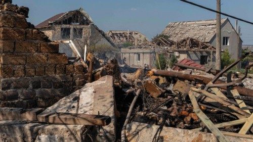 (FILES) This photograph shows damaged houses on a site following an air attack, in the Odesa region, ... (FILES) This photograph shows damaged houses on a site following an air attack, in the Odesa region, ...