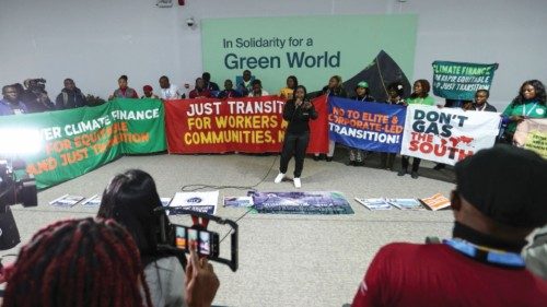 Environmental activists hold a protest during the COP29 United Nations climate change conference, in ... Environmental activists hold a protest during the COP29 United Nations climate change conference, in ...
