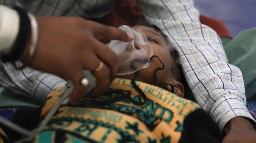 epa11734509 Patient Vikas, four years old, suffering from suspected pneumonia disease receives ...
