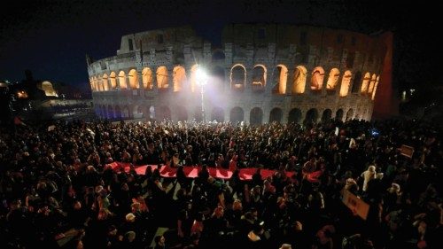 Protesters march by the Colosseum during a demonstration against sexism and sexual violence against ... Protesters march by the Colosseum during a demonstration against sexism and sexual violence against ...