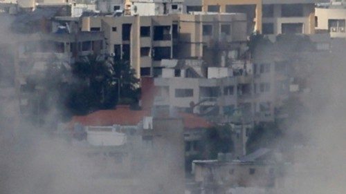 Smoke billows over Beirut's southern suburbs after an Israeli strike, amid hostilities between ...