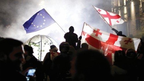epa11748861 Georgian opposition supporters wave EU and Georgian flags during a protest in front of ... epa11748861 Georgian opposition supporters wave EU and Georgian flags during a protest in front of ...