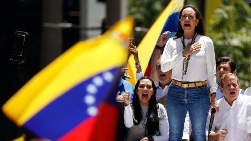 (FILES) Venezuelan opposition leader Maria Corina Machado signs the Venezuelan national anthem ... (FILES) Venezuelan opposition leader Maria Corina Machado signs the Venezuelan national anthem ...