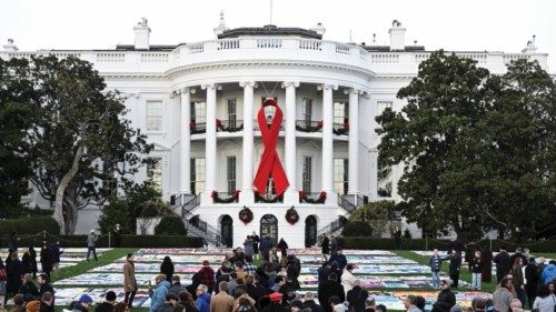 People walk past the AIDS Memorial Quilt on display for the first time on the South Lawn of the ... People walk past the AIDS Memorial Quilt on display for the first time on the South Lawn of the ...