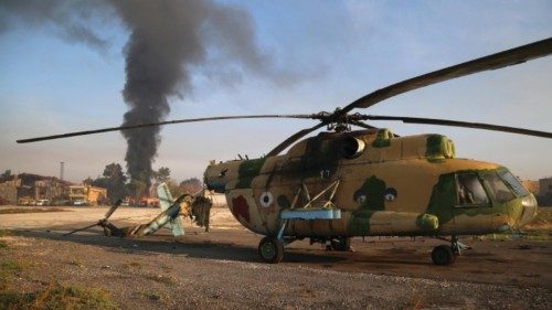 epa11752880 A damaged helicopter of the Syrian Army at the Nayrab military airport, in Aleppo, ... epa11752880 A damaged helicopter of the Syrian Army at the Nayrab military airport, in Aleppo, ...