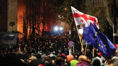 Police forces are seen deployed outside the parliament building as protesters rally for the fifth ... Police forces are seen deployed outside the parliament building as protesters rally for the fifth ...