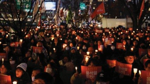 Protesters hold banners reading 'Crime of rebellion, Yoon Seok Yeol resign' during a rally to ... Protesters hold banners reading 'Crime of rebellion, Yoon Seok Yeol resign' during a rally to ...