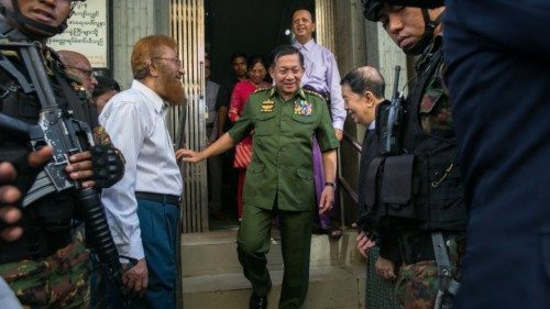 (FILES) Myanmar's Commander-in-Chief Senior General Min Aung Hlaing (C) leaves after visiting the ... (FILES) Myanmar's Commander-in-Chief Senior General Min Aung Hlaing (C) leaves after visiting the ...