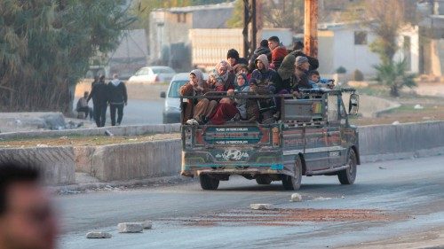 Displaced Syrians drive through Khan Shaykhun town as they evacuate northward to flee confrontation ... Displaced Syrians drive through Khan Shaykhun town as they evacuate northward to flee confrontation ...