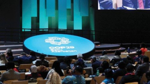 A screen displays EU Climate Action Commissioner Wopke Hoekstra as he speaks during a closing ... A screen displays EU Climate Action Commissioner Wopke Hoekstra as he speaks during a closing ...