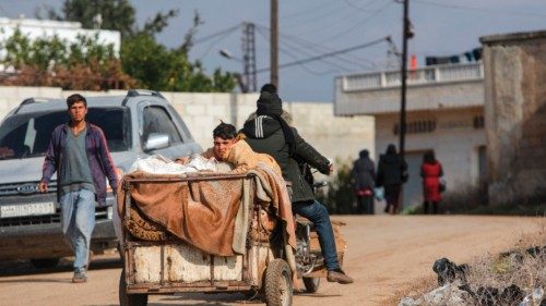Displaced Syrians drive through Khan Shaykhun town as they evacuate northward to flee confrontation ... Displaced Syrians drive through Khan Shaykhun town as they evacuate northward to flee confrontation ...