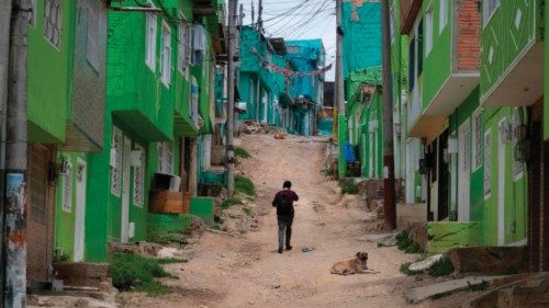 TOPSHOT - A boy walks along a street in Ciudad Bolivar, Bogota, on May 25, 2022, days ahead of ...