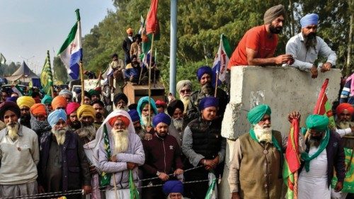 Farmers gather as they call for a march towards India's capital, Delhi, during a protest at the ... Farmers gather as they call for a march towards India's capital, Delhi, during a protest at the ...