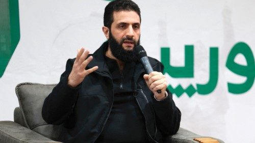 (FILES) -- Abu Mohamed al-Jolani, who heads the Islamist group Hayat Tahrir al-Sham (HTS), speaks ...