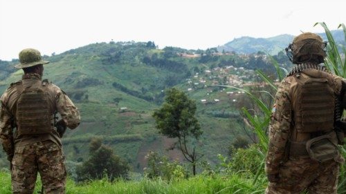 FILE PHOTO: Members of the Armed Forces of the Democratic Republic of the Congo (FARDC) stand guard ... FILE PHOTO: Members of the Armed Forces of the Democratic Republic of the Congo (FARDC) stand guard ...