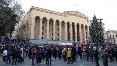 Anti-government demonstrators gather outside the parliament building as parliament members elect a ... Anti-government demonstrators gather outside the parliament building as parliament members elect a ...
