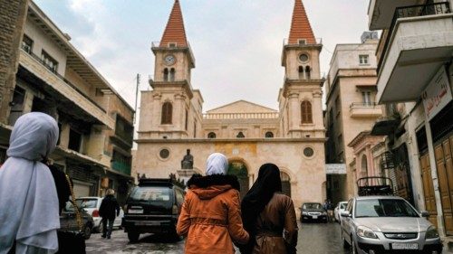 Women walk in Farhat Square outside the Maronite Cathedral of Saint Elijah (Mar Elias) in Syria's ... Women walk in Farhat Square outside the Maronite Cathedral of Saint Elijah (Mar Elias) in Syria's ...