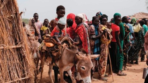 (FILES) Ali Abdula, 16, guides his donkey carrying his two younger siblings, both suffering from ... (FILES) Ali Abdula, 16, guides his donkey carrying his two younger siblings, both suffering from ...