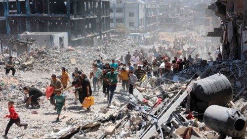 TOPSHOT - -- AFP PICTURES OF THE YEAR 2024 --

Palestinians who returned briefly to the Jabalia ...