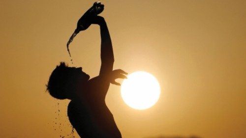 FILE PHOTO: A runner cools down with water in Skopje, North Macedonia July 12, 2023. REUTERS/Ognen ... FILE PHOTO: A runner cools down with water in Skopje, North Macedonia July 12, 2023. REUTERS/Ognen ...