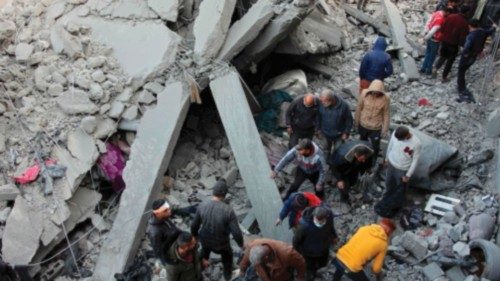 Civilians check the site of an Israeli strike in Jabalia, in the central Gaza Strip, on December 27, ... Civilians check the site of an Israeli strike in Jabalia, in the central Gaza Strip, on December 27, ...