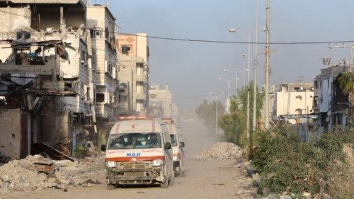 TOPSHOT - Ambulances transport wounded Palestinians from the Kamal Adwan Hospital to the al-Shifa ...